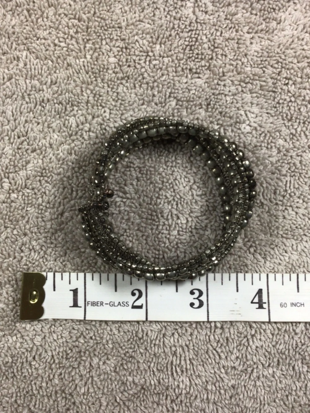 vintage-style metallic multi-strand bead cuff bracelet